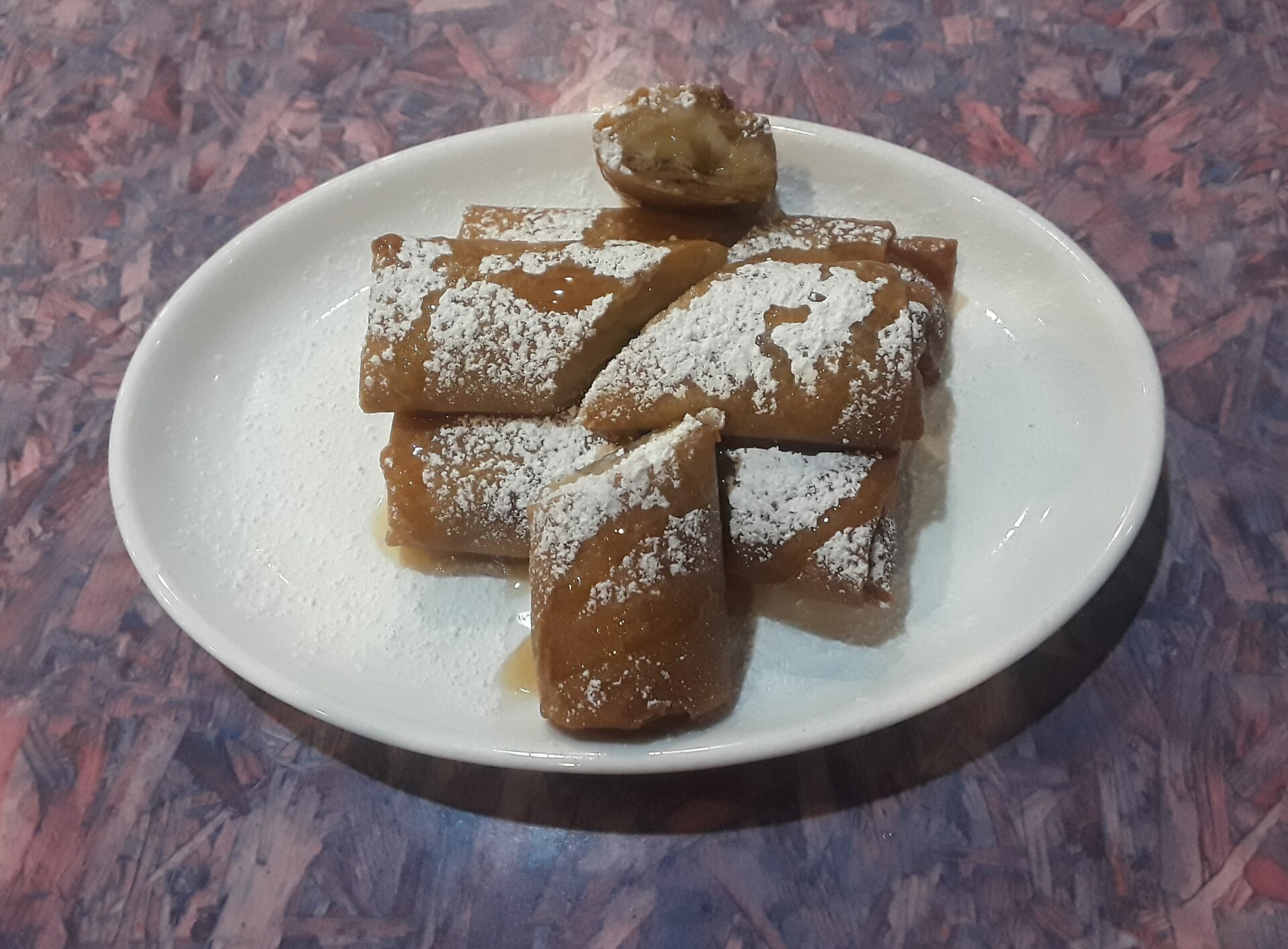 Glasierte Bananen im Vanillesud mit Mango & Passionsfrucht